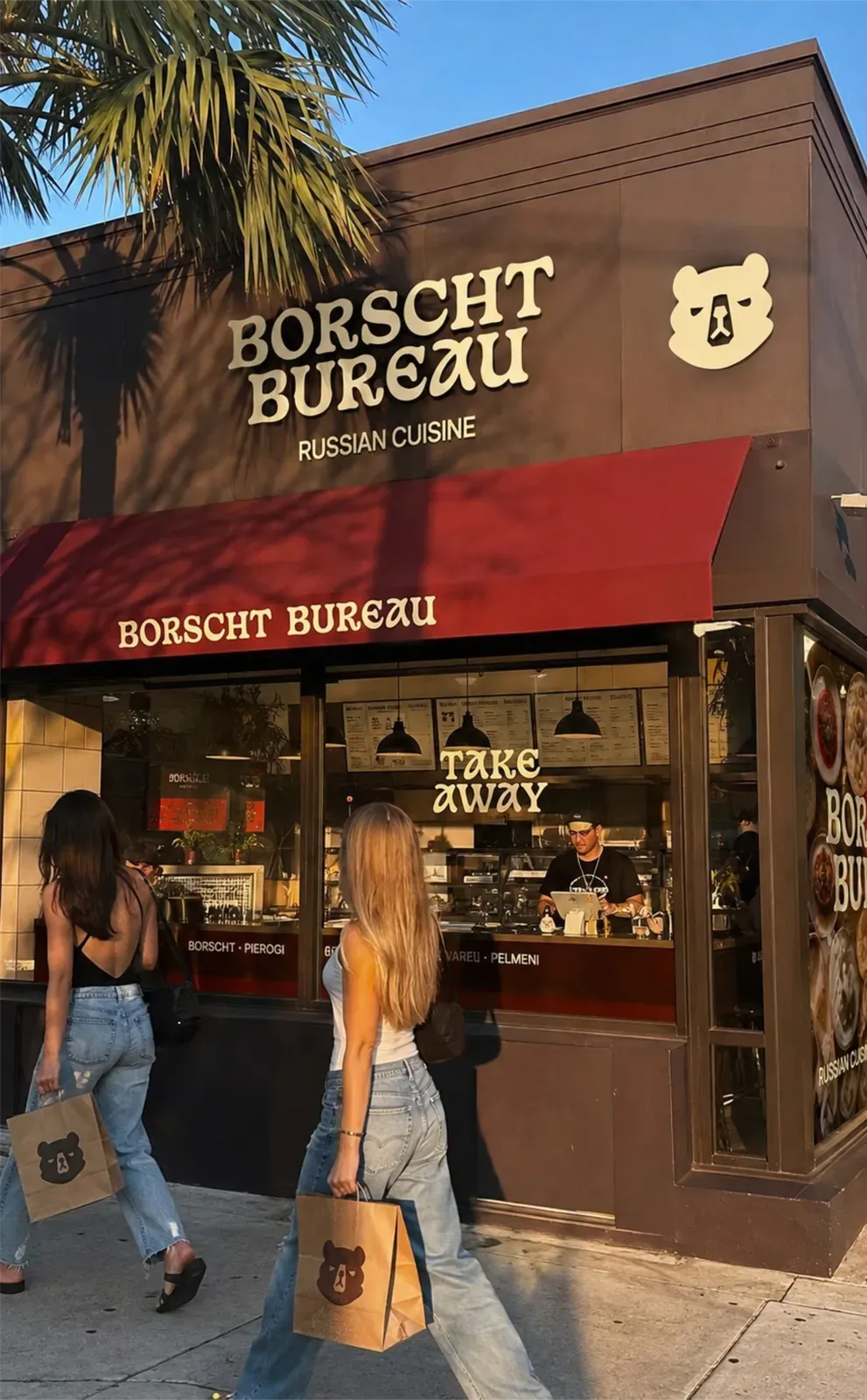 Borscht Bureau exterior signage at street level.
